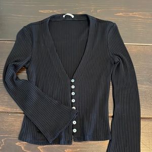 REFORMATION. GELLAR KNIT TOP. NEVER WORN. SIZE SMALL. V NECK. BUTTON DETAIL